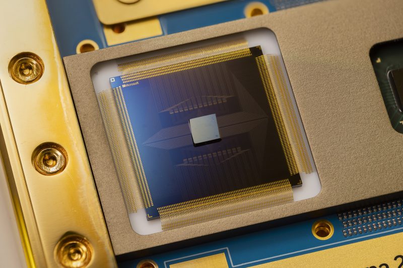 An extreme closeup of a mostly gold-colored chip with bits of blue showing.