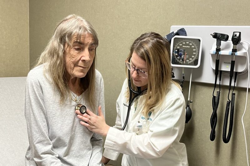 Two women shown in a doctors office