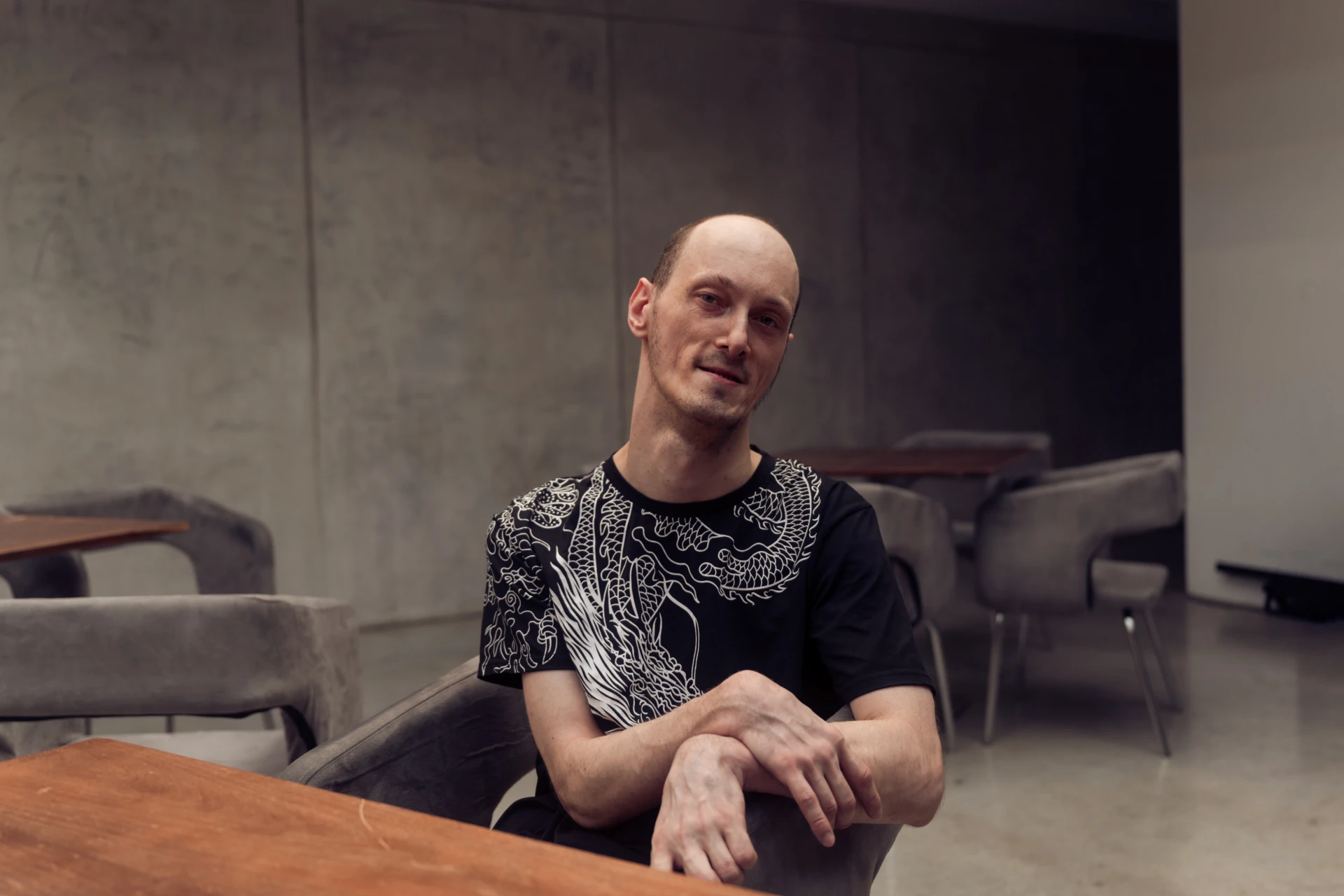 A man sits at a table