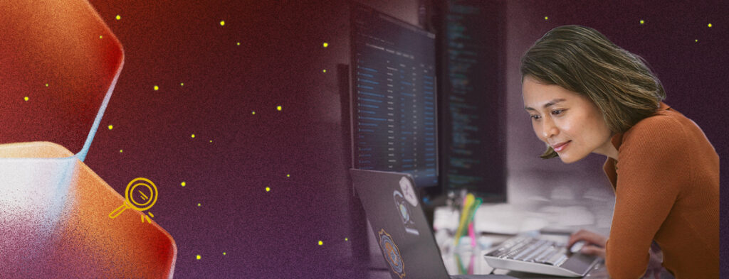 A woman sits at a desk with a laptop and two monitors; colorful background with shapes
