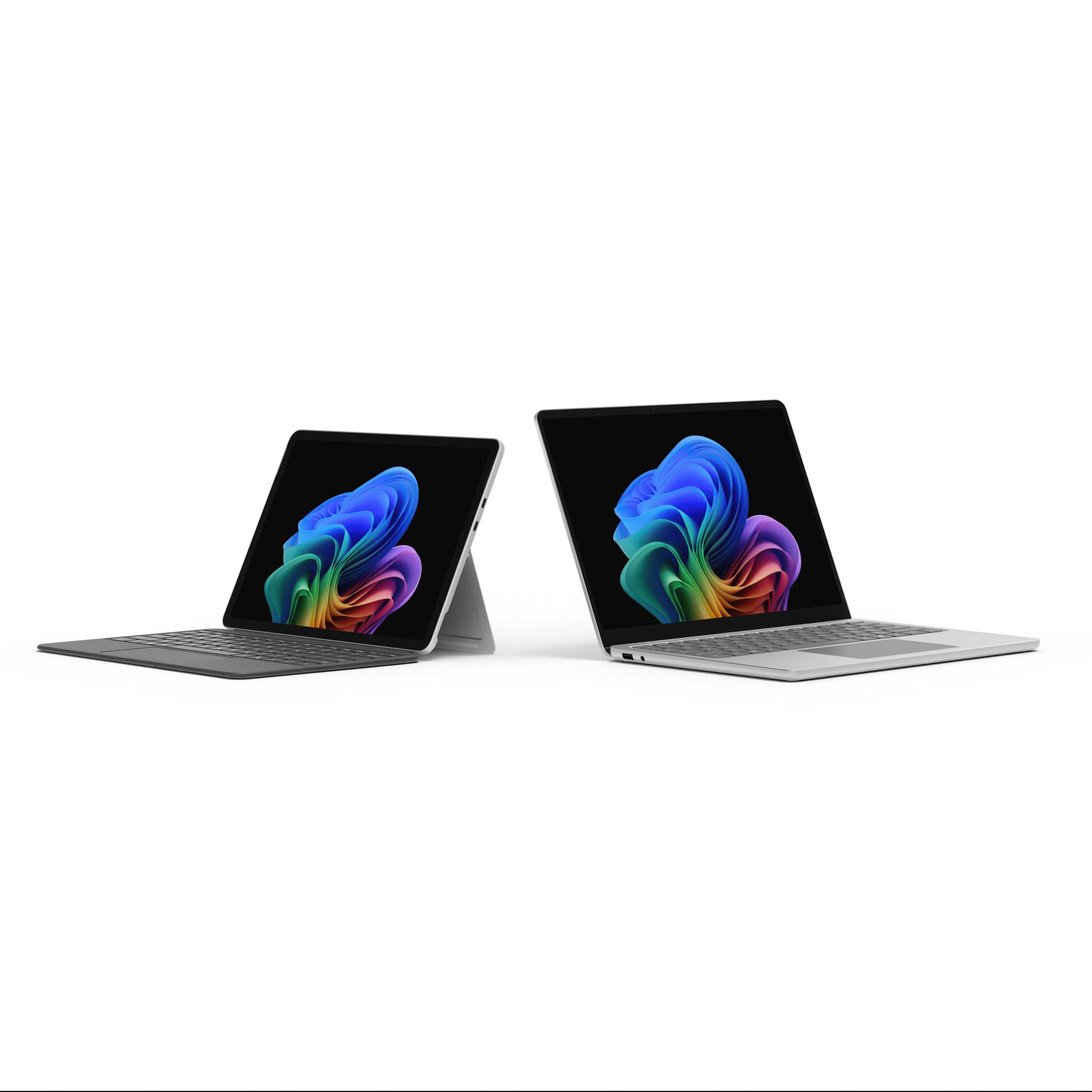 A Surface Pro and Surface Laptop open side by side with Windows screensaver.