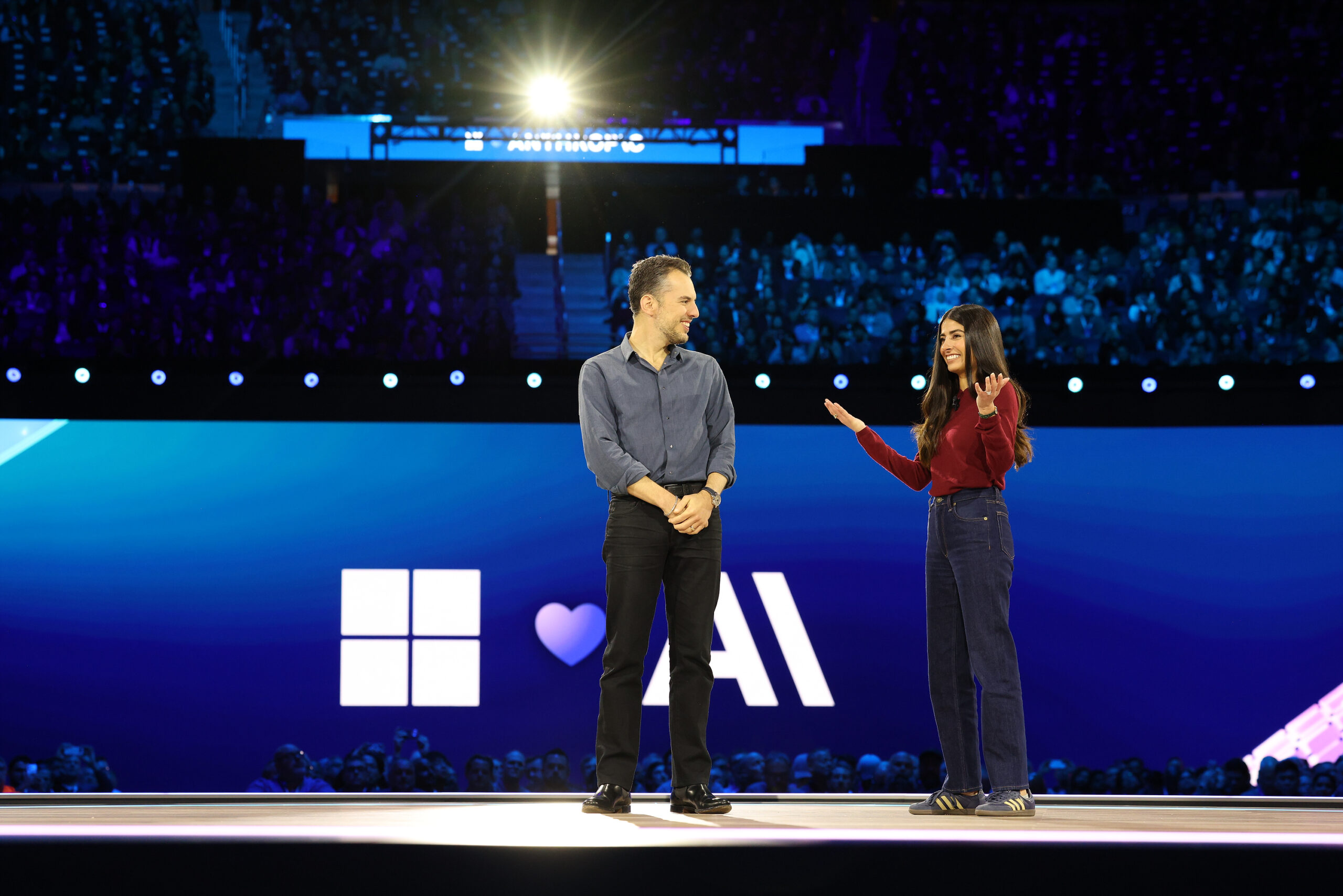 Woman and man onstage at Microsoft Ignite.