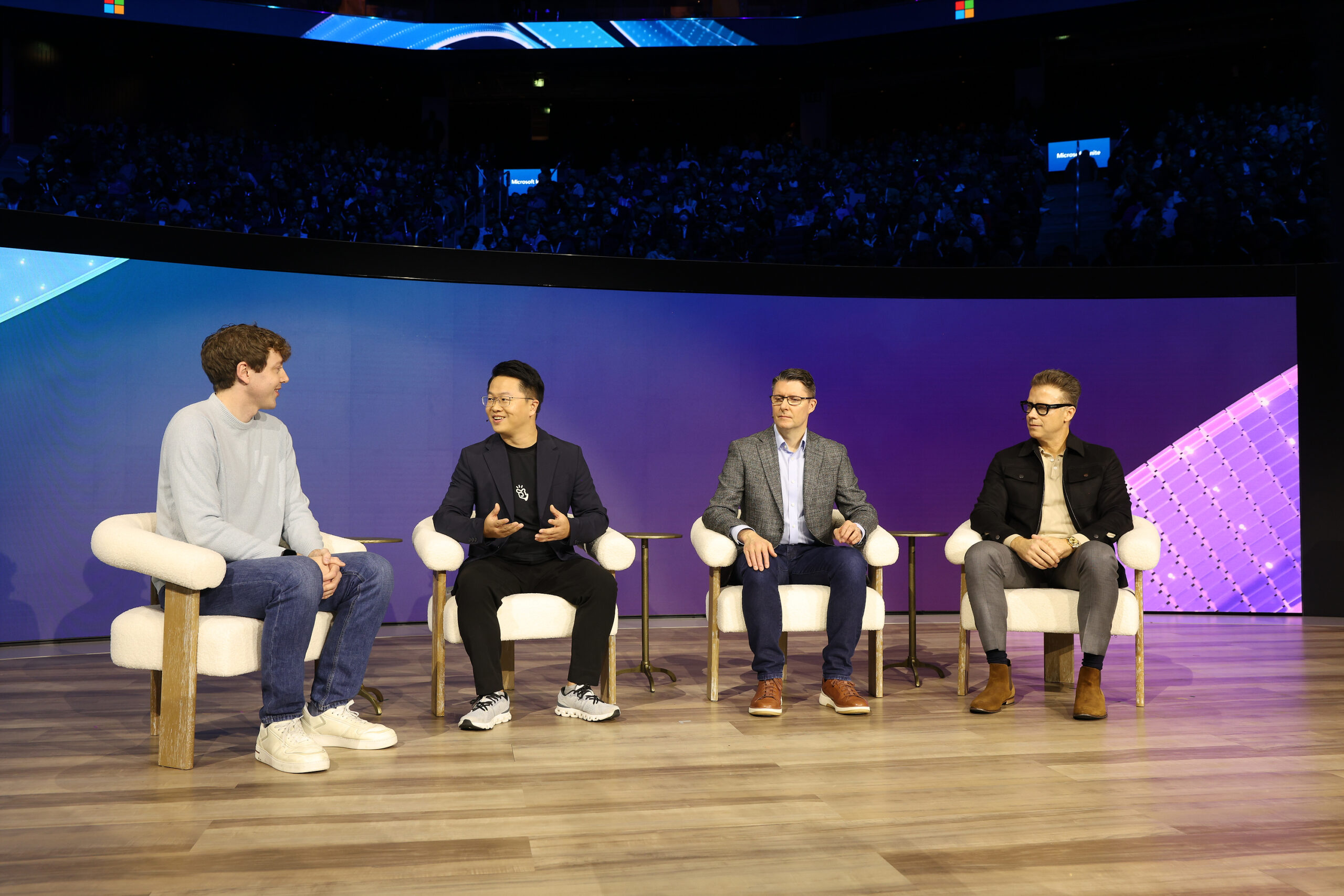Four people onstage at Microsoft Ignite.