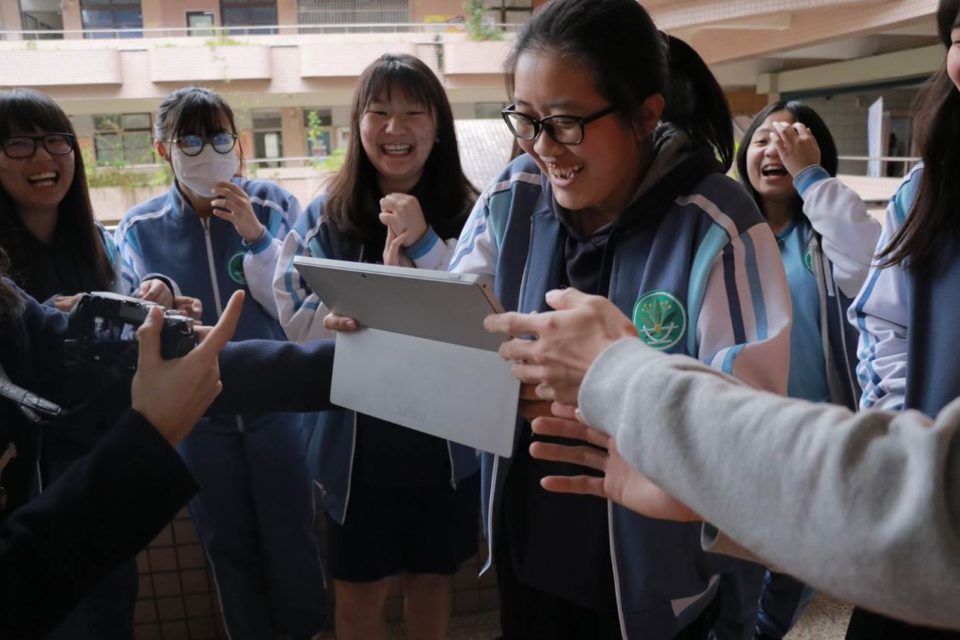 Girls at event with surface
