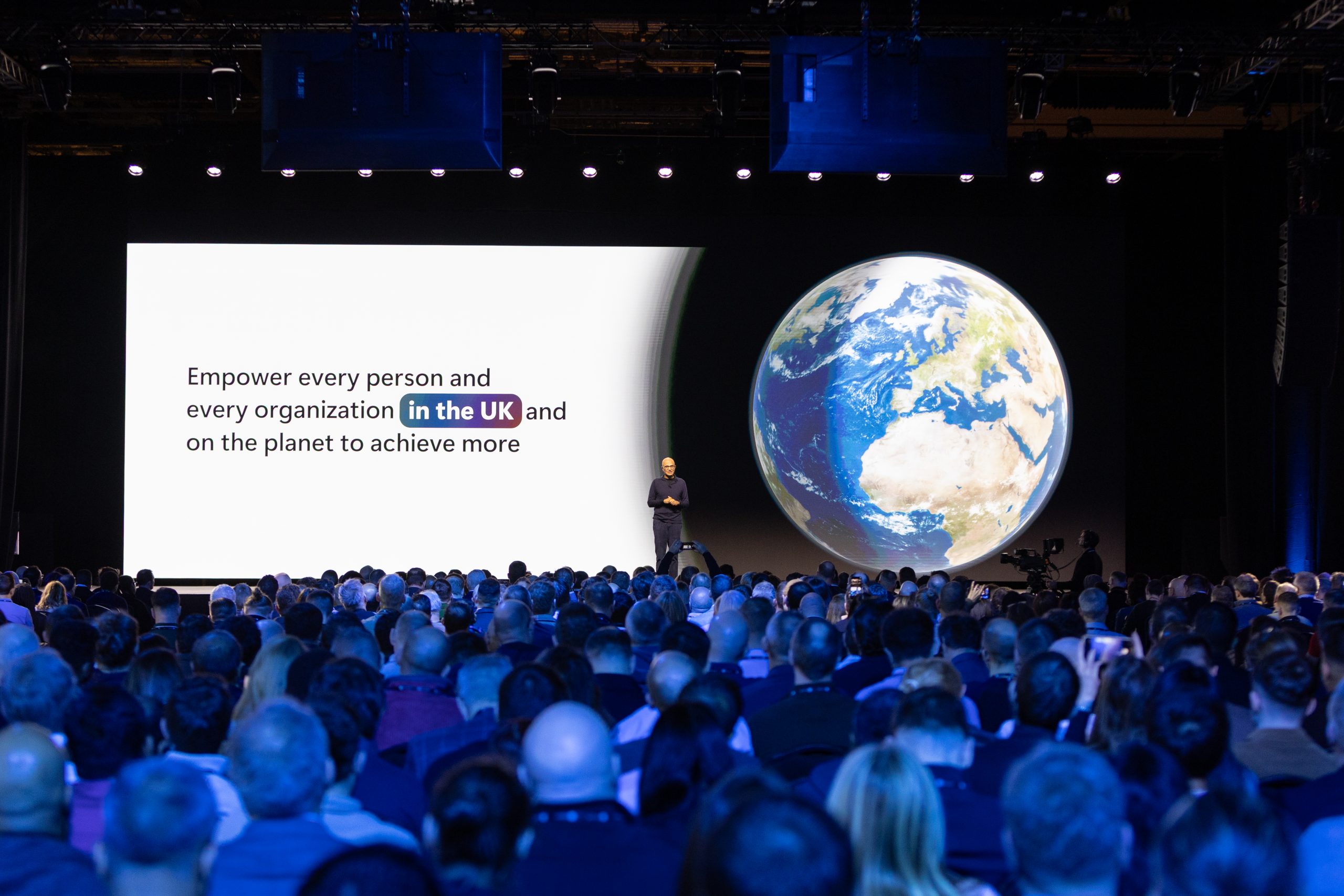 Satya Nadella in the UK discussing Microsoft’s AI transformation framework with government and industry leaders.