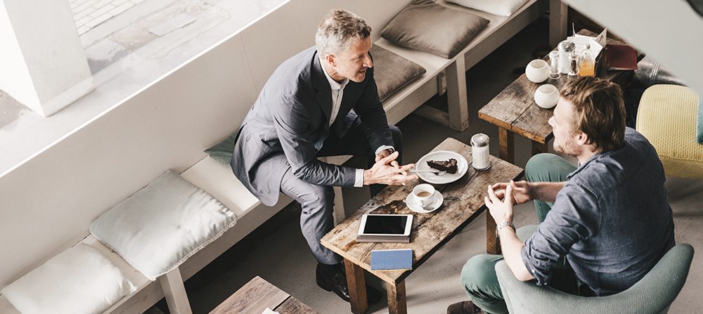 Office workers in a discussion