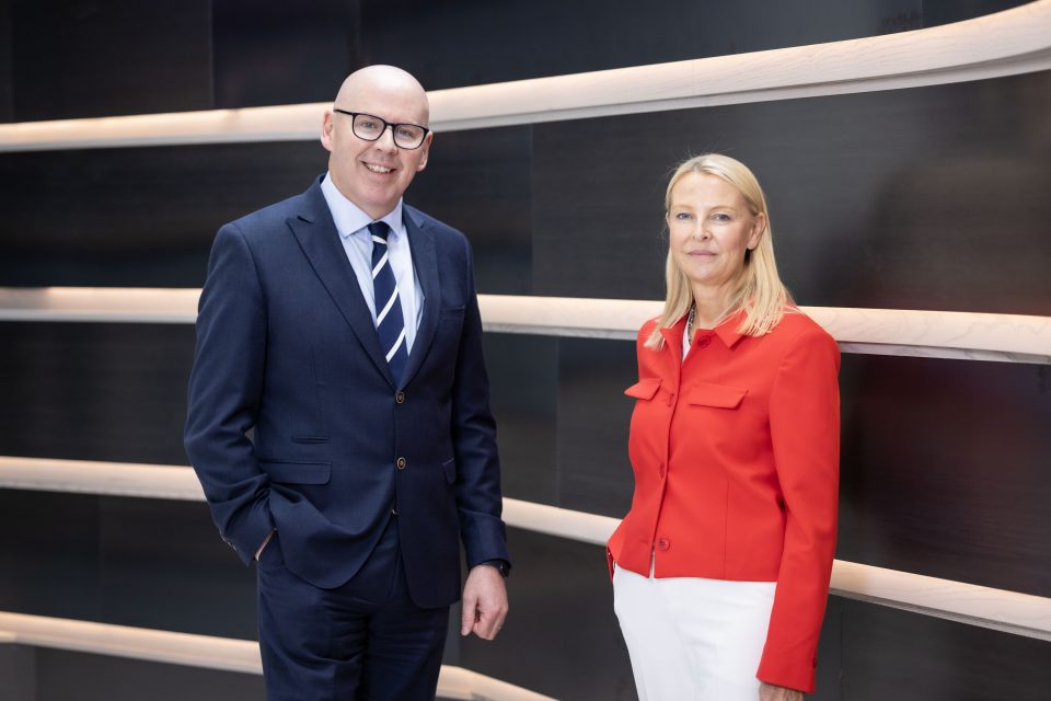 GM of MSFT Ireland and CTO AIB in front of a horizontal striped background